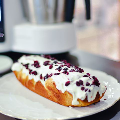 Coconut cake with chocolate and cranberries topping