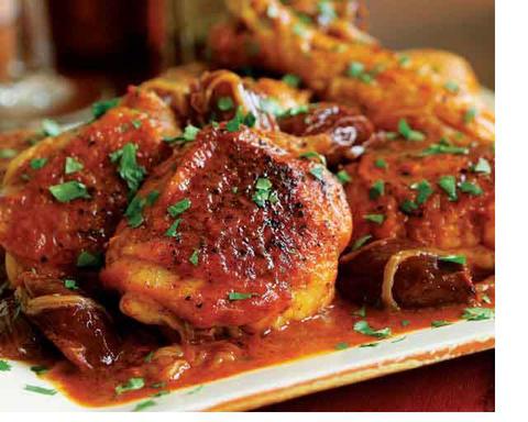 Chicken thighs with sauce and mashed potatoes