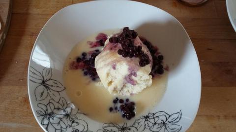 Yeast dumplings with blueberries and vanilla sauce