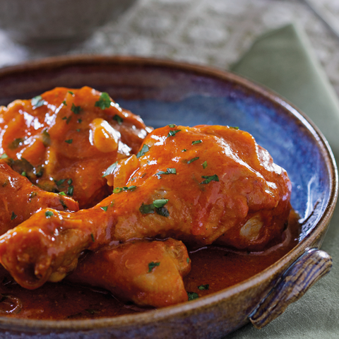 Chicken in red sauce with mashed potatoes